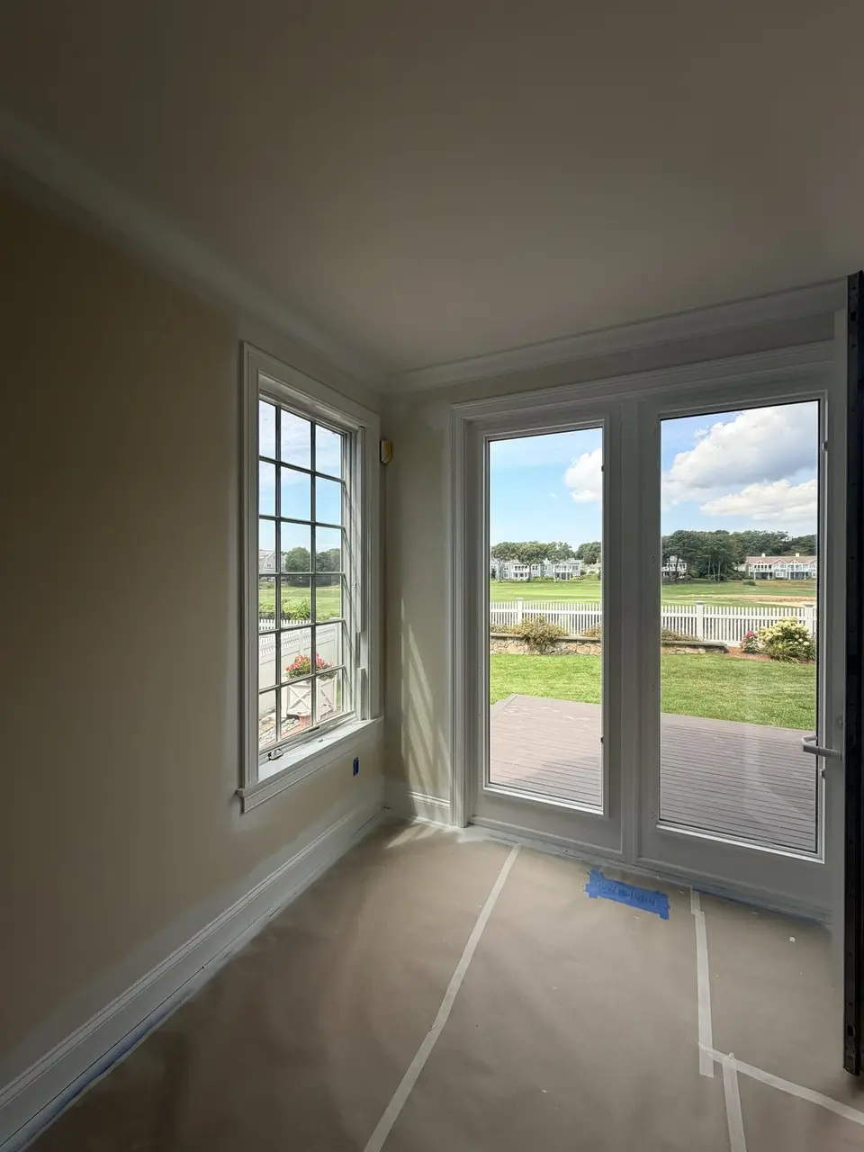 Room with french doors, interior painting in progress